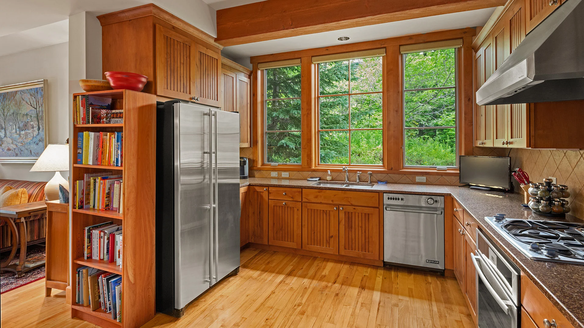 Full kitchen with bookshelf